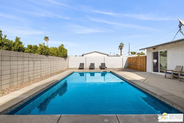 view of pool with a patio