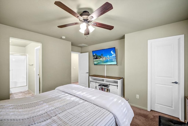 bedroom featuring ceiling fan, light colored carpet, and ensuite bathroom