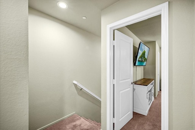 corridor with carpet floors