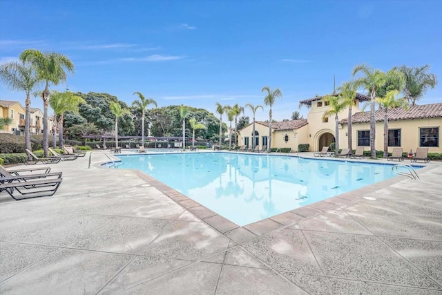 view of swimming pool featuring a patio