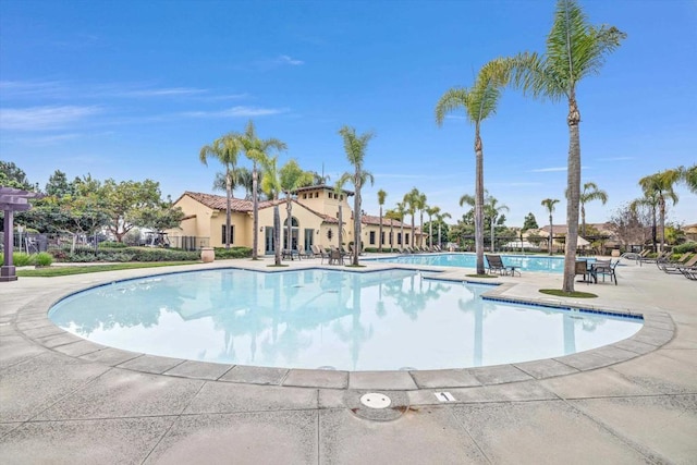 view of swimming pool featuring a patio