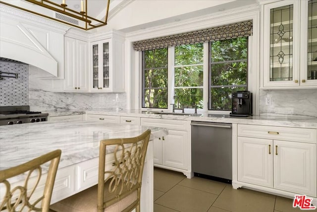 kitchen with white cabinetry, tasteful backsplash, dishwasher, light stone counters, and sink