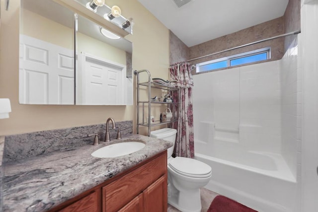 full bathroom with toilet, vanity, and shower / bath combination with curtain