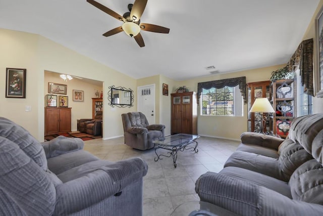 tiled living room featuring vaulted ceiling and ceiling fan