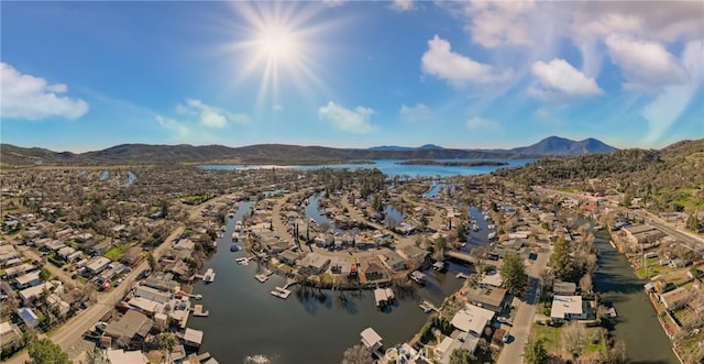 aerial view with a water and mountain view