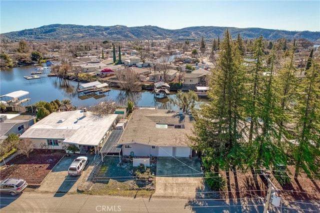 aerial view with a water and mountain view