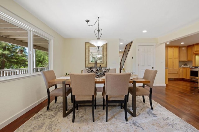 dining space featuring hardwood / wood-style flooring