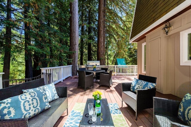 deck featuring outdoor lounge area