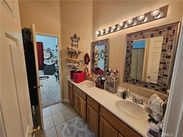 bathroom featuring tile patterned floors and vanity