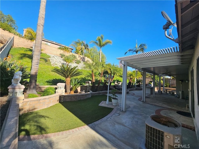 view of yard with a pergola and a patio