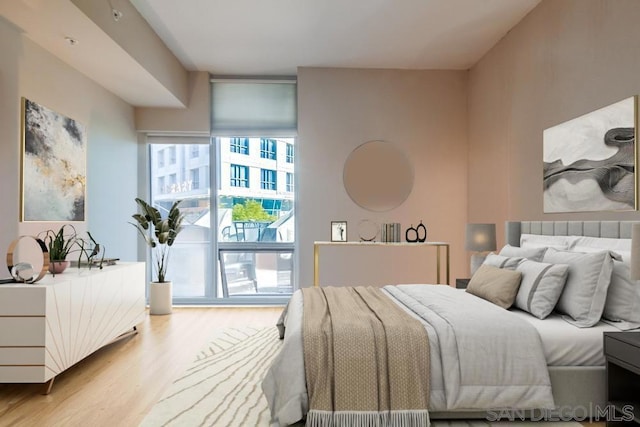 bedroom featuring light hardwood / wood-style floors