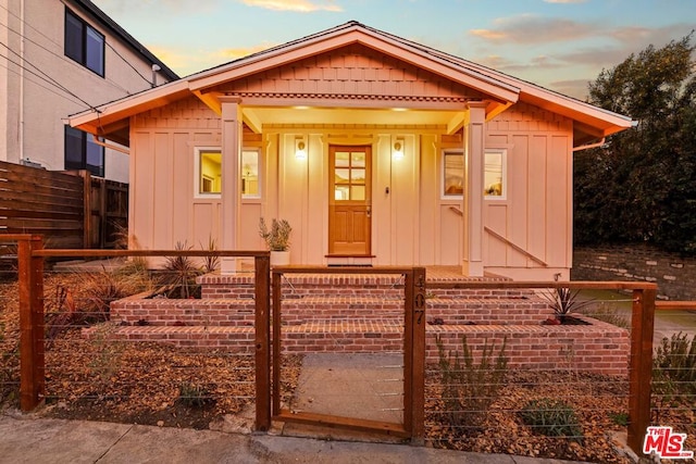 bungalow-style house with covered porch