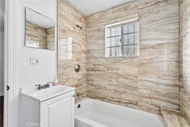 bathroom featuring vanity and shower / bathing tub combination