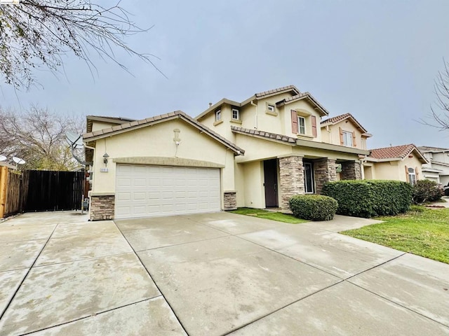 view of front of home with a garage