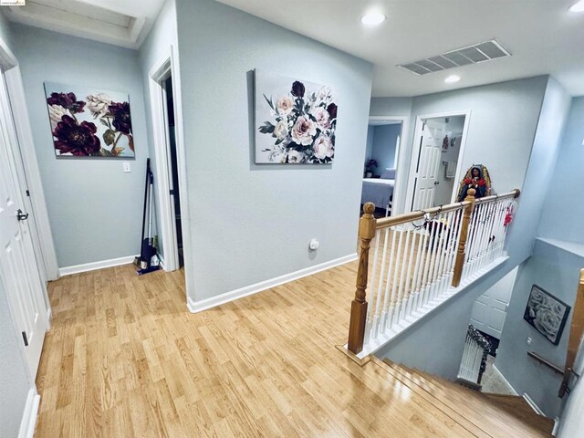 hallway featuring light hardwood / wood-style floors