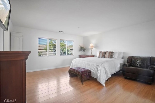 bedroom featuring light wood-type flooring