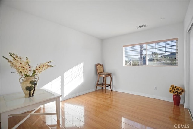 empty room featuring hardwood / wood-style flooring