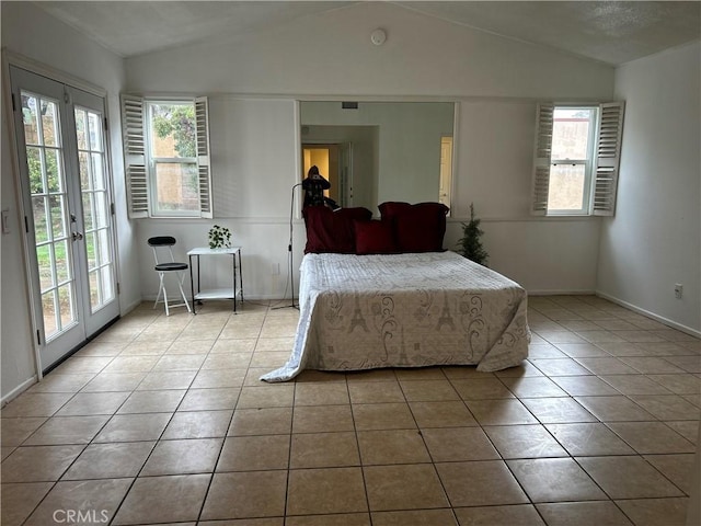 7265 Fletcher View Dr, Highland, CA 92346 - tiled bedroom featuring lofted ceiling and access to outside