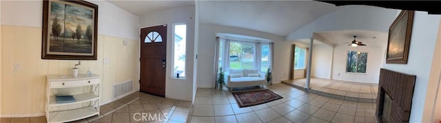 7265 Fletcher View Dr, Highland, CA 92346 - foyer entrance featuring light tile patterned floors, vaulted ceiling, ceiling fan, and baseboards