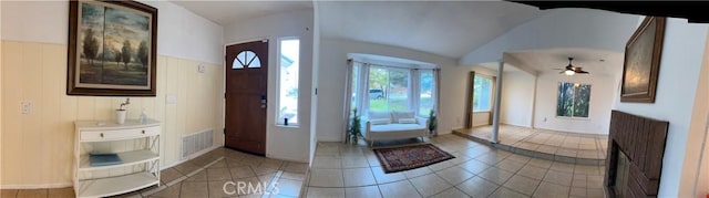 7265 Fletcher View Dr, Highland, CA 92346 - foyer featuring light tile patterned floors, vaulted ceiling, and a ceiling fan