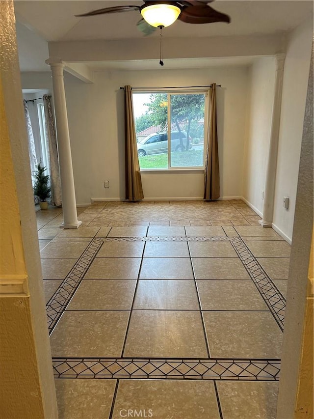 7265 Fletcher View Dr, Highland, CA 92346 - unfurnished room with decorative columns, ceiling fan, inlaid floor details, and baseboards