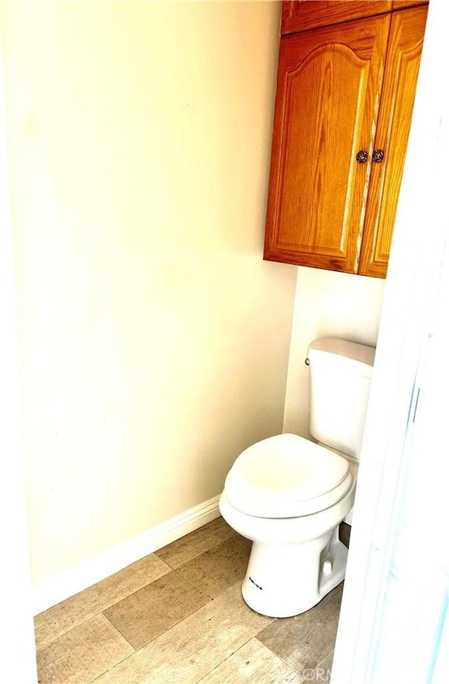 7265 Fletcher View Dr, Highland, CA 92346 - bathroom featuring toilet and baseboards