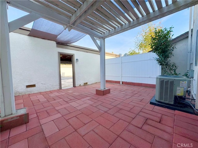 view of patio featuring central AC unit and a pergola