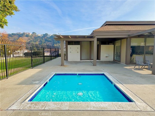 view of pool featuring a patio