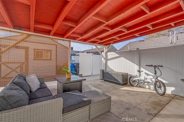 view of patio / terrace with fence and an outdoor living space