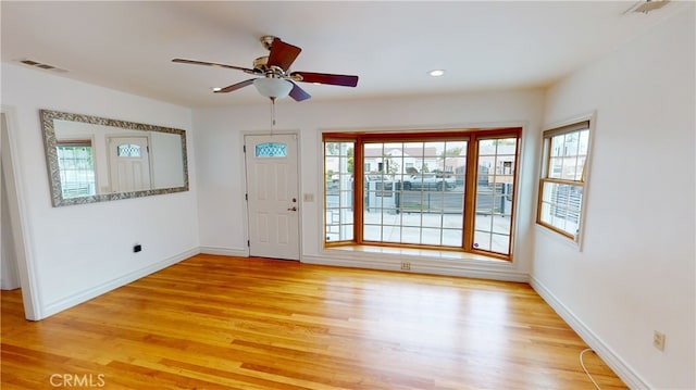 entrance foyer featuring recessed lighting, visible vents, a ceiling fan, light wood-type flooring, and baseboards