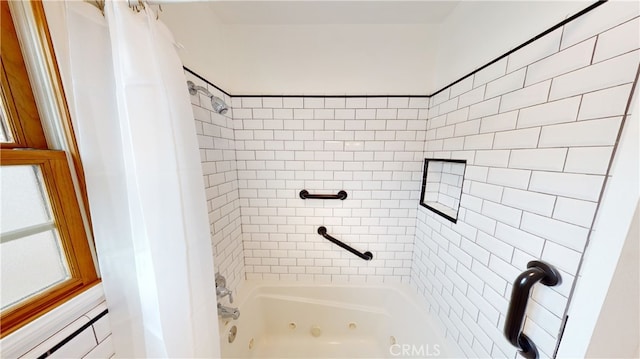 bathroom featuring a combined bath / shower with jetted tub