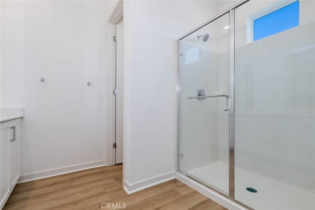1053 Cadence, Irvine, CA 92618 - bathroom with hardwood / wood-style floors and walk in shower