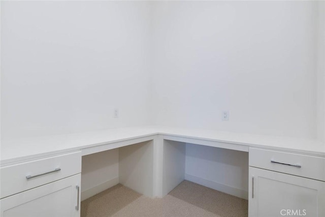 1053 Cadence, Irvine, CA 92618 - unfurnished office featuring light carpet and built in desk