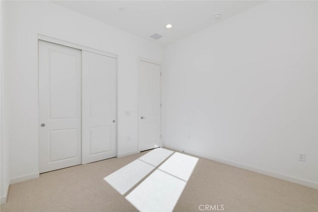 1053 Cadence, Irvine, CA 92618 - unfurnished bedroom featuring light carpet and a closet