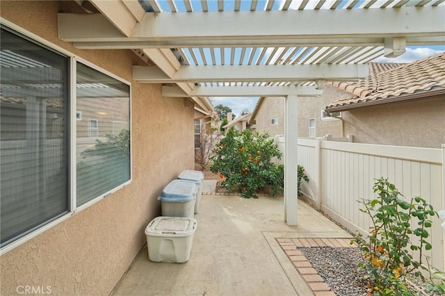 view of patio featuring a pergola