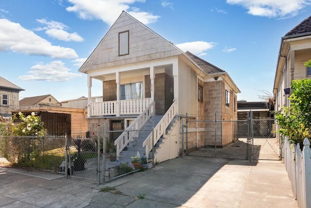 bungalow featuring covered porch