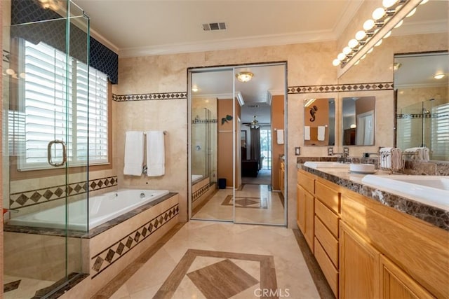 bathroom with plus walk in shower, ceiling fan, crown molding, and vanity