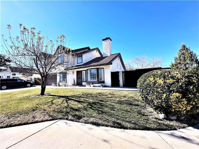 view of front facade with a front lawn