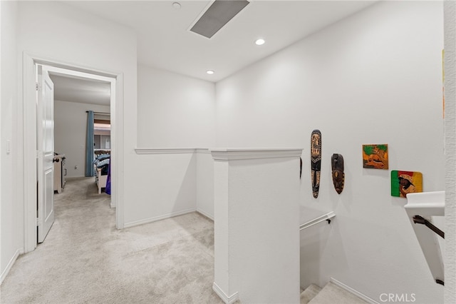 interior space featuring baseboards and recessed lighting