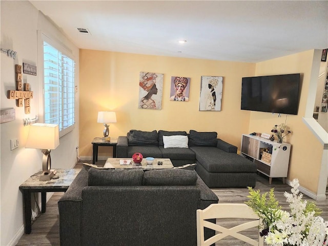 living room featuring dark hardwood / wood-style floors