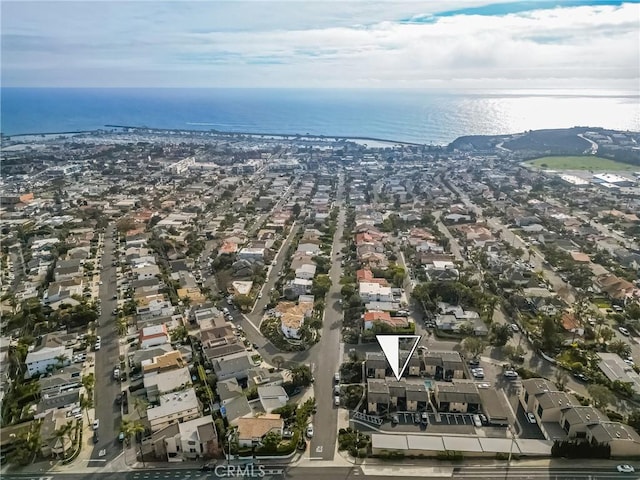 bird's eye view featuring a residential view and a water view