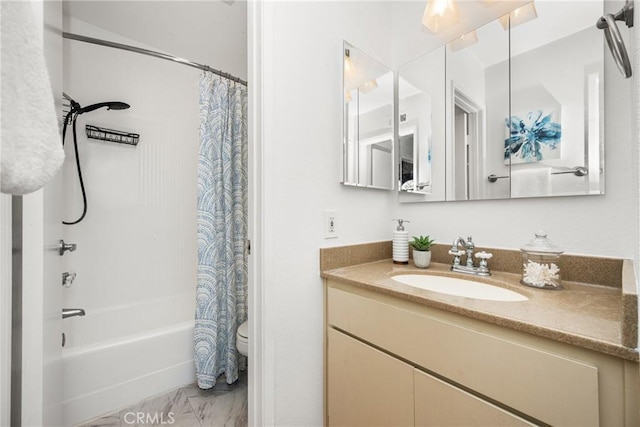 full bath with marble finish floor, shower / tub combo with curtain, vanity, and toilet