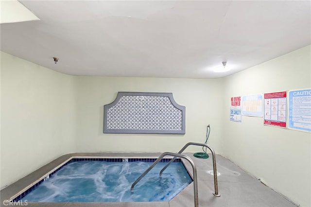 view of swimming pool featuring an indoor in ground hot tub