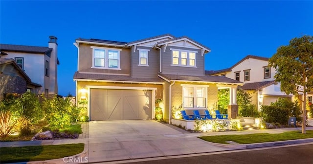 view of front of home featuring a garage