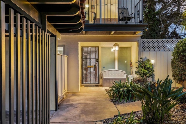 property entrance with a balcony