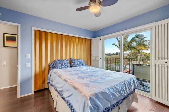 bedroom with ceiling fan, access to exterior, and dark hardwood / wood-style floors