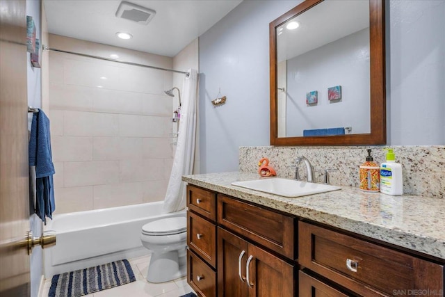 full bathroom with toilet, decorative backsplash, shower / bath combo with shower curtain, tile patterned floors, and vanity