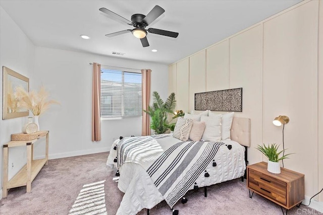 carpeted bedroom with ceiling fan