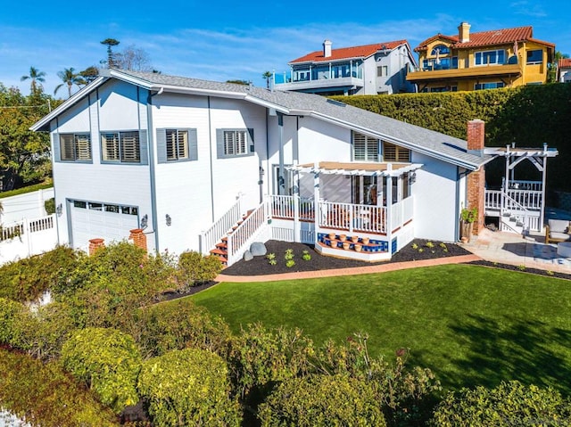 exterior space with a front lawn and a garage