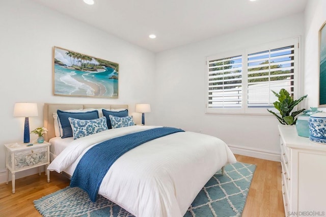 bedroom featuring light hardwood / wood-style floors